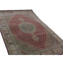 Elegant wool and silk base Tabriz rug